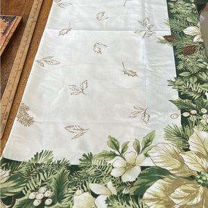 Saint Nicolas Square 60 inches by 102 poinsettia tablecloth